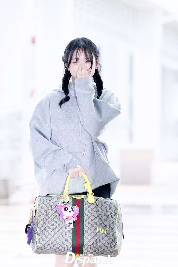 Netizens are asking NewJeans Hanni to break up with Gucci after seeing her style on the way to Milan Fashion Week