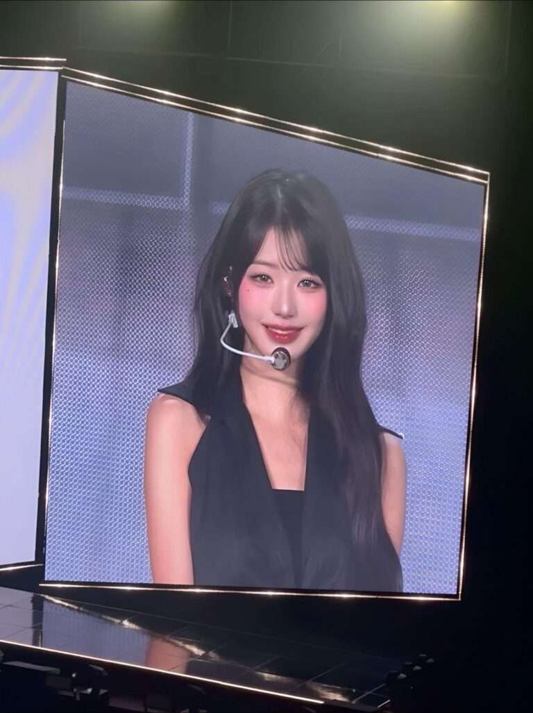 Jang Wonyoung on the electronic board at the fanmeeting