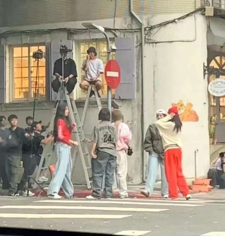 NewJeans was spotted shooting something on the street