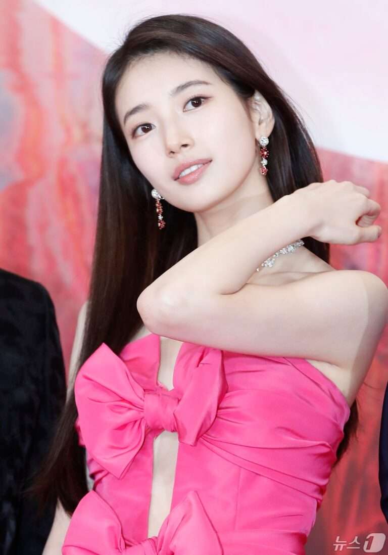 Suzy on the red carpet at the Baeksang Arts Awards wearing a pink dress